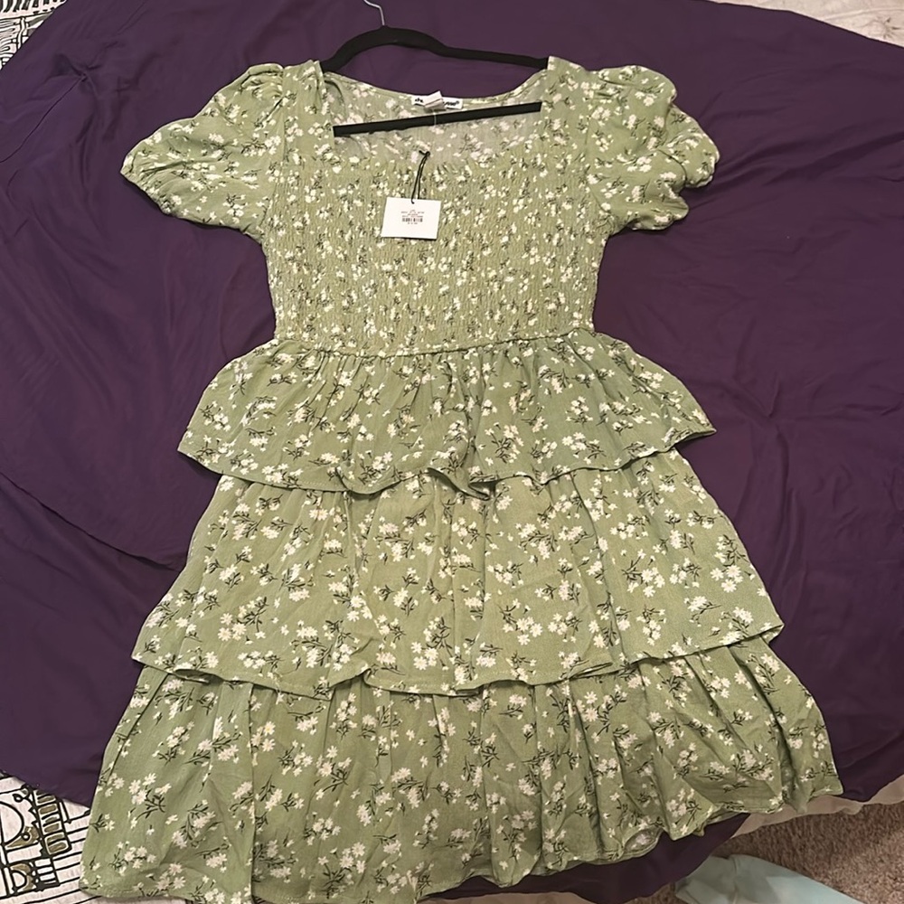 A Charlotte Russe  green dress with flowers on it